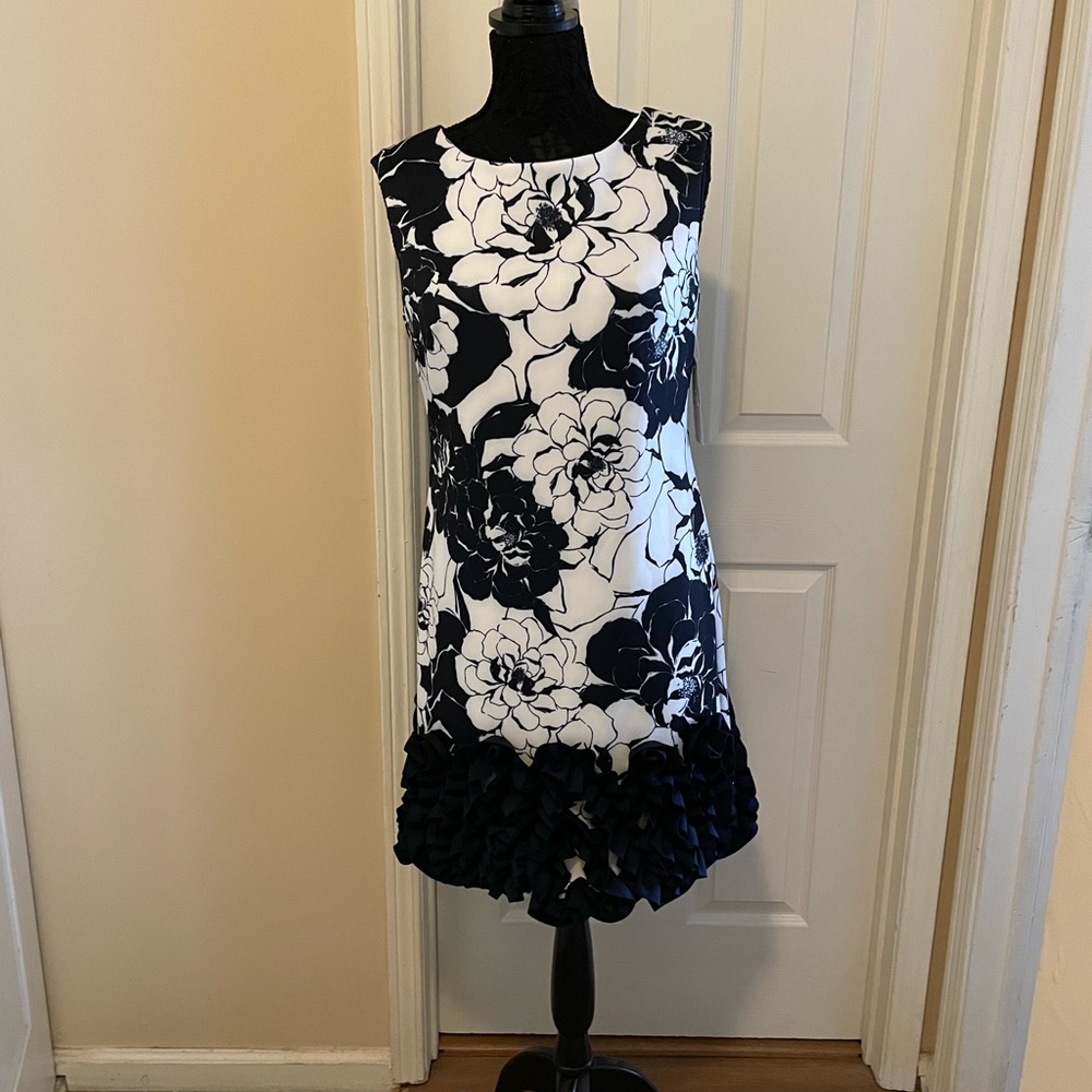 Worn once! Donna Ricco navy and white print scuba dress ruffled bottom. Size 10